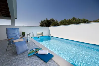 Image de Maison de vacances Drvenik Veliki pour 1 - 6 personnes avec 3 chambres à coucher - Maison mitoyenne