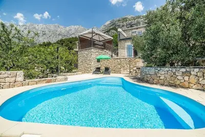 Image de Maison de vacances Makarska pour 1 - 4 personnes avec 1 chambre à coucher - Maison mitoyenne