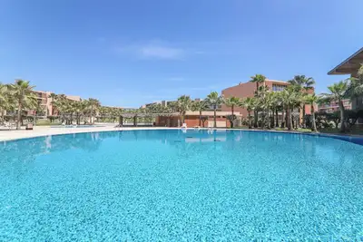 Image de Appartement Salgados 12c avec piscine, Wi-Fi, A\/C, balcon et jardin