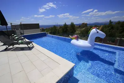 Image de Maison de vacances Podstrana pour 1 - 7 personnes avec 2 chambres à coucher - Maison de vacances