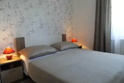 Image de Appartement de vacances Radići pour 1 - 4 personnes avec 2 chambres à coucher - Maison de vacances