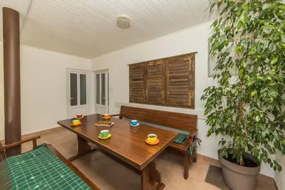 Image de Appartement de vacances Makarska pour 1 - 8 personnes avec 3 chambres à coucher - Maison de vacances