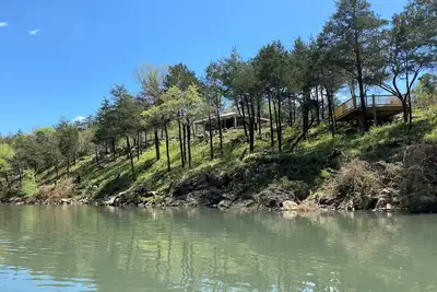 Image de The Haven - Kiamichi Mountain Riverside Cabin