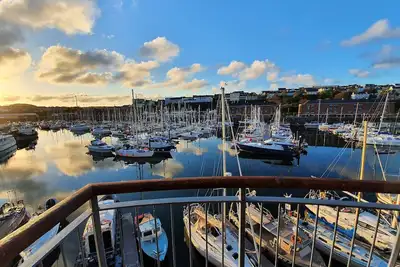 Image de Picked for its stunning marina & estuary views with tasty restaurants in walking distance.