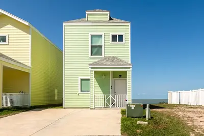 Bright Waterfront Home with Shared Pool, Water View, and High-Speed WiFi