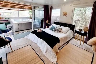 Image de L'Escale - loft jacuzzi et hammam privés