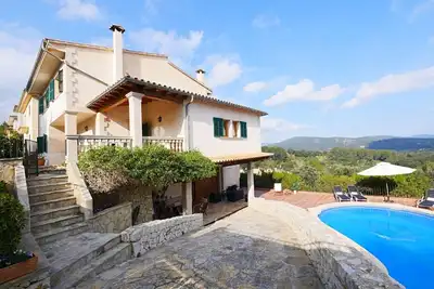 Image de Maison Bellavista avec vue sur les montagnes, Wi-Fi, climatisation, piscine, jardin et balcon