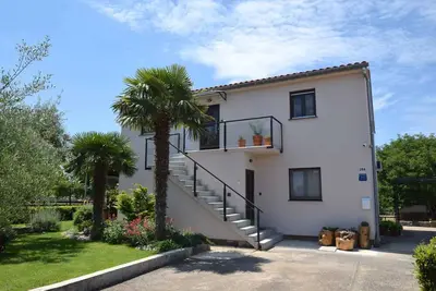 Image de Appartement de vacances avec une galerie ouverte