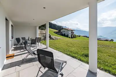 Image de \"Ferienwohnung am Mühlbachl\" avec vue sur les montagnes, terrasse privée et Wi-Fi.