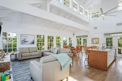 Stunning canal-front home with pools, Ac, W/D & hammock