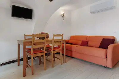 Image de Appartement 'Logge Dei Paroloti Agnese' avec vue sur la montagne, terrasse partagée et Wi-Fi