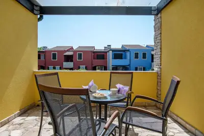 Image de Appartement de vacances avec air conditionné pour les familles près de la mer