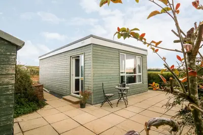 Image de The Lodge, romantic, with a garden in South Molton