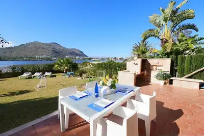 Image de Maison \"Casa Mediterraneo\" près de la plage, vue sur le lac, Wi-Fi, climatisation, terrasse, jardin