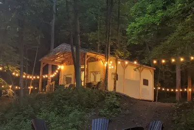 Image de Custom design Safari Tent overlooking a serene running creek & natural waterfall