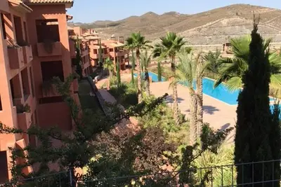 Image de Appartement directement sur le golf et la piscine