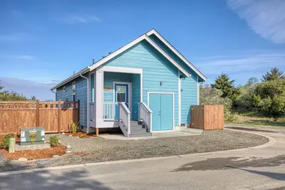 Image de Coral Beach Cottage - Oyhut Bay Seaside Village