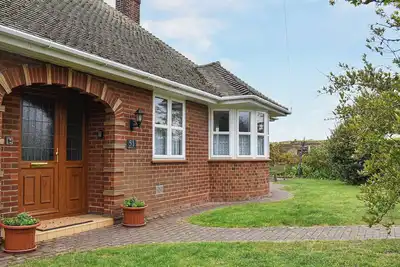 Image de Beautiful tucked away property close to the town and beach.