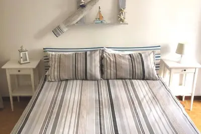 Image de appartamento con giardino privato 3 minuti dalla spiaggia