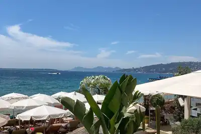 Image de 64 m2  2 chambres 3 minutes à pieds de la plage mais calme climatisation et WiFi