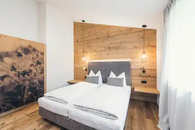 Image de Appartement \"Lichtung Woldererhof Auszeit\" avec vue sur les montagnes et balcon