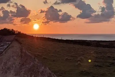 Image de Cosy Cottage with stunning Sea/Sunset view.