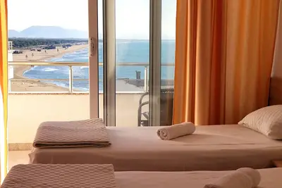 Image de Comfy twin room with separated beds, double sofa bed - sea view balcony