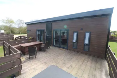 Image de A superior lodge 3 that sleeps 8 guests in 3 bedrooms