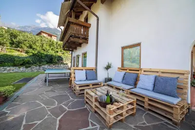 Image de Appartement \"Langeshof - Morgensonne\" avec vue sur les montagnes, balcon et jardin