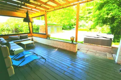 Image de Relax in your whirlpool right next to the forest & 750m to the beach