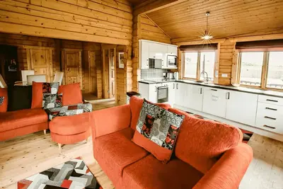 Image de A luxury log cabin that sleeps 5 guests in 2 bedrooms