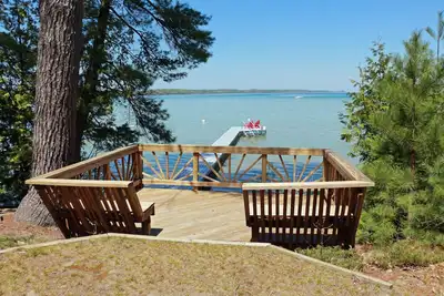Image de Torch Lake Sandbar Waterfront Home - with Dock!