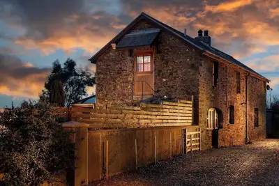 Image de Trysor Holiday Cottage a stunning Coach house with sea views, near Penbryn beach