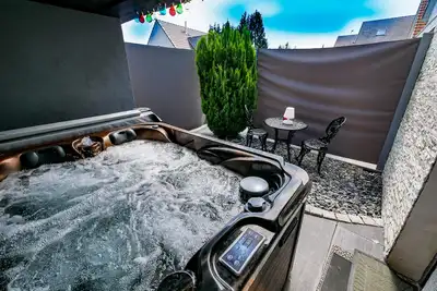 Image de Studio Romantique | Jacuzzi et Terasse privé,