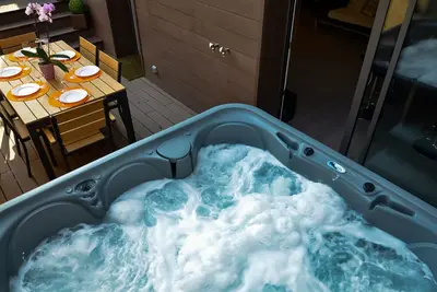 Image de Appartement Design | Jacuzzi, Sauna, Terrasse, Clim, Gite le 14