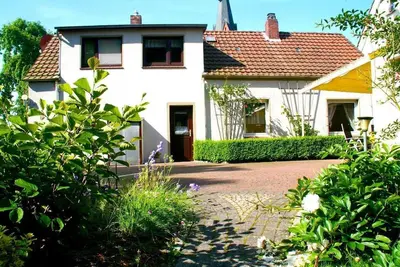 Image de Maison de vacances Burhave pour 1 - 5 personnes avec 3 chambres à coucher - Maison de vacances