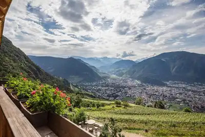Image de Appartement de vacances \"Latemar - Wernerhof\" avec vue sur les montagnes, balcon et jardin