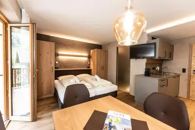 Image de Appartement \"Bergfrieden 2 A\" avec vue sur les montagnes, piscine, Wi-Fi, terrasse et jardin