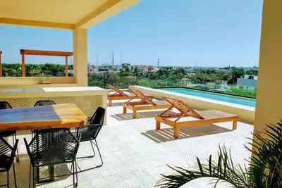 Image de Kaab AtP new Apt with rooftop pool, cozy.