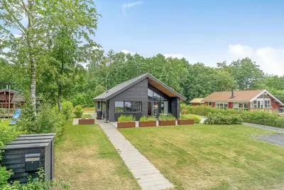 Image de Maison acceptant les animaux de compagnie à Sunds avec vue sur le lac