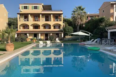 Image de Maison de vacances Acharavi pour 8 - 20 personnes avec 10 chambres Ă coucher - Maison de vacances