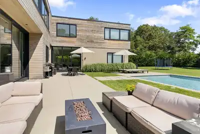 Image de Recently constructed modern-style home with a gated entrance, private pool, . . .