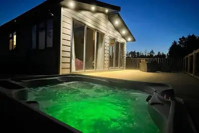 Image de Lodge-Premium-Salle de bain et douche-Vue sur le bois
