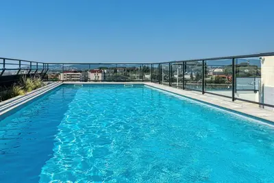 Image de Joli appartement pour 5 personnes avec piscine, Wifi, climatisation, Tv, terrasse et parking