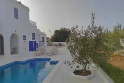 Image de Maison Zahra 03 suites avec piscine