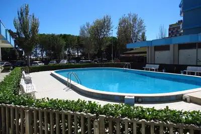Image de Appartement front de mer dans une résidence avec piscine