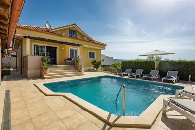 Image de Villa Krase kids friendly for 10 persons near Rakalj with sauna - fitness & playground