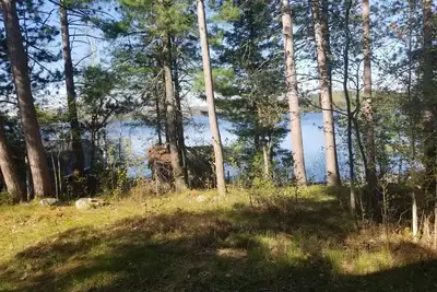 Image de Lakefront Camp and Boat House on Upper Lake Chateaugay