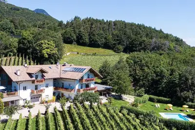 Image de Appartement de vacances Kurting an der Weinstraße (Cortina sulla Strada del Vino) pour 1 - 6 personn