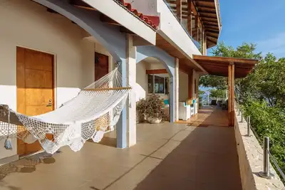 Beach front villa surrounded by ocean views, steps from the beach